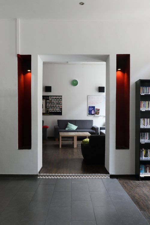 Passage to another room. A small step hinders the passage for wheelchair users.