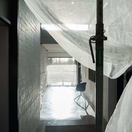 The hallway in a Vila with a view into the living area.